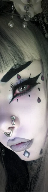 Free dark romance bookmark featuring characters with facial piercings